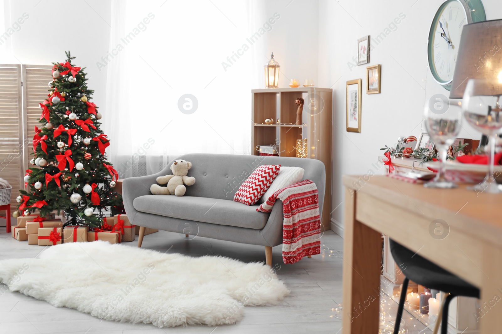 Photo of Living room interior with decorated Christmas tree