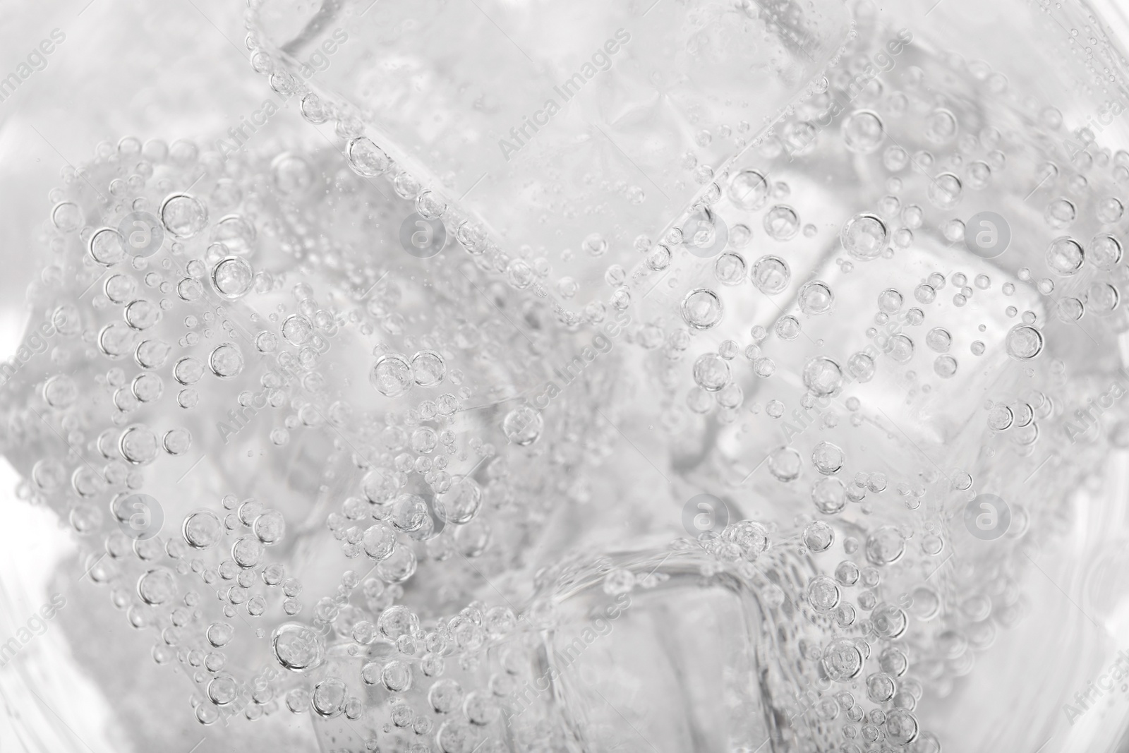 Photo of Top view of soda water with ice in glass