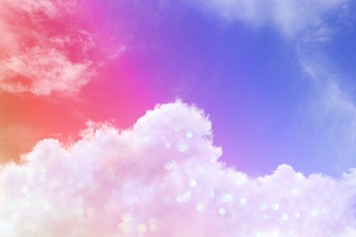 Image of Magic sky with fluffy clouds toned in bright colors