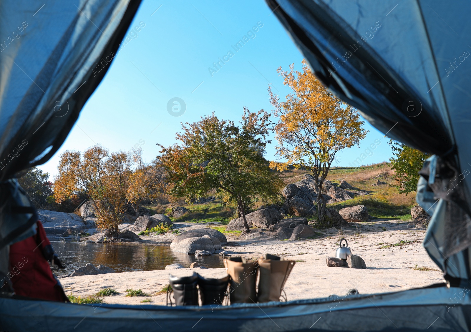 Photo of Picturesque coast near pond, view from camping tent