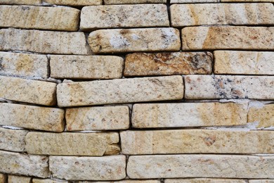 Texture of old stone wall as background, closeup