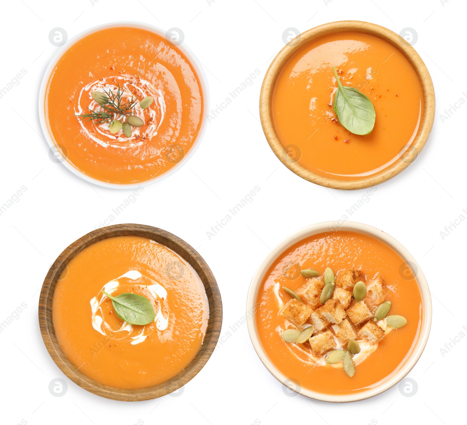 Image of Set of fresh pumpkin soups on white background, top view