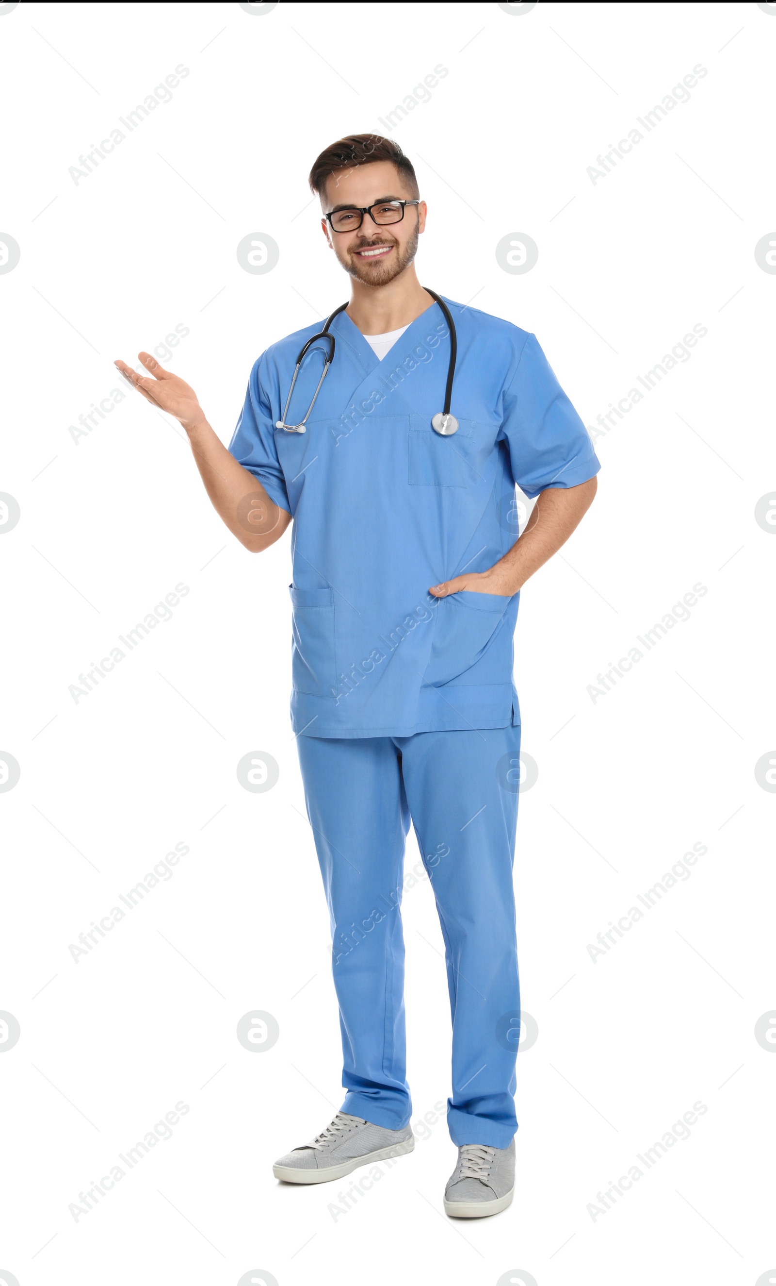 Photo of Full length portrait of medical doctor with stethoscope isolated on white