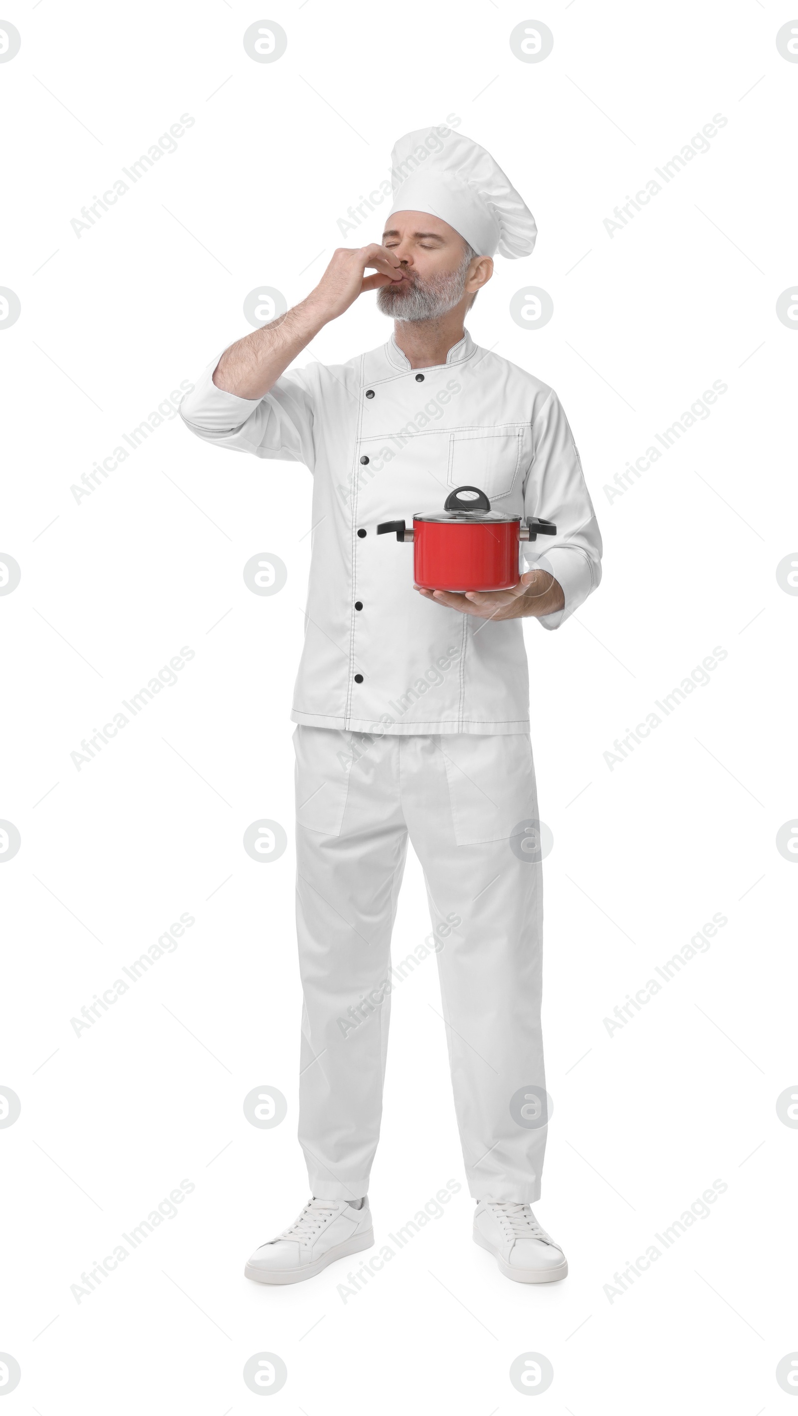 Photo of Chef in uniform with cooking pot showing perfect sign on white background