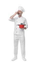 Photo of Chef in uniform with cooking pot showing perfect sign on white background