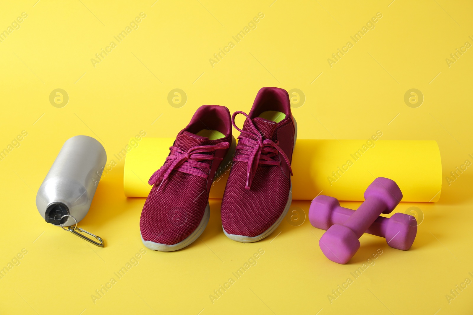 Photo of Fitness equipment on color background. Healthy lifestyle