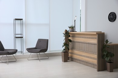 Lobby interior with stylish wooden receptionist desk