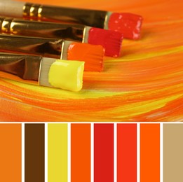 Image of Palette of autumn colors and different brushes with bright paints, closeup