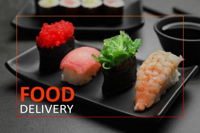 Image of Set of delicious sushi on grey table. Food delivery service 