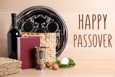 Image of Symbolic Pesach (Passover Seder) items on wooden table