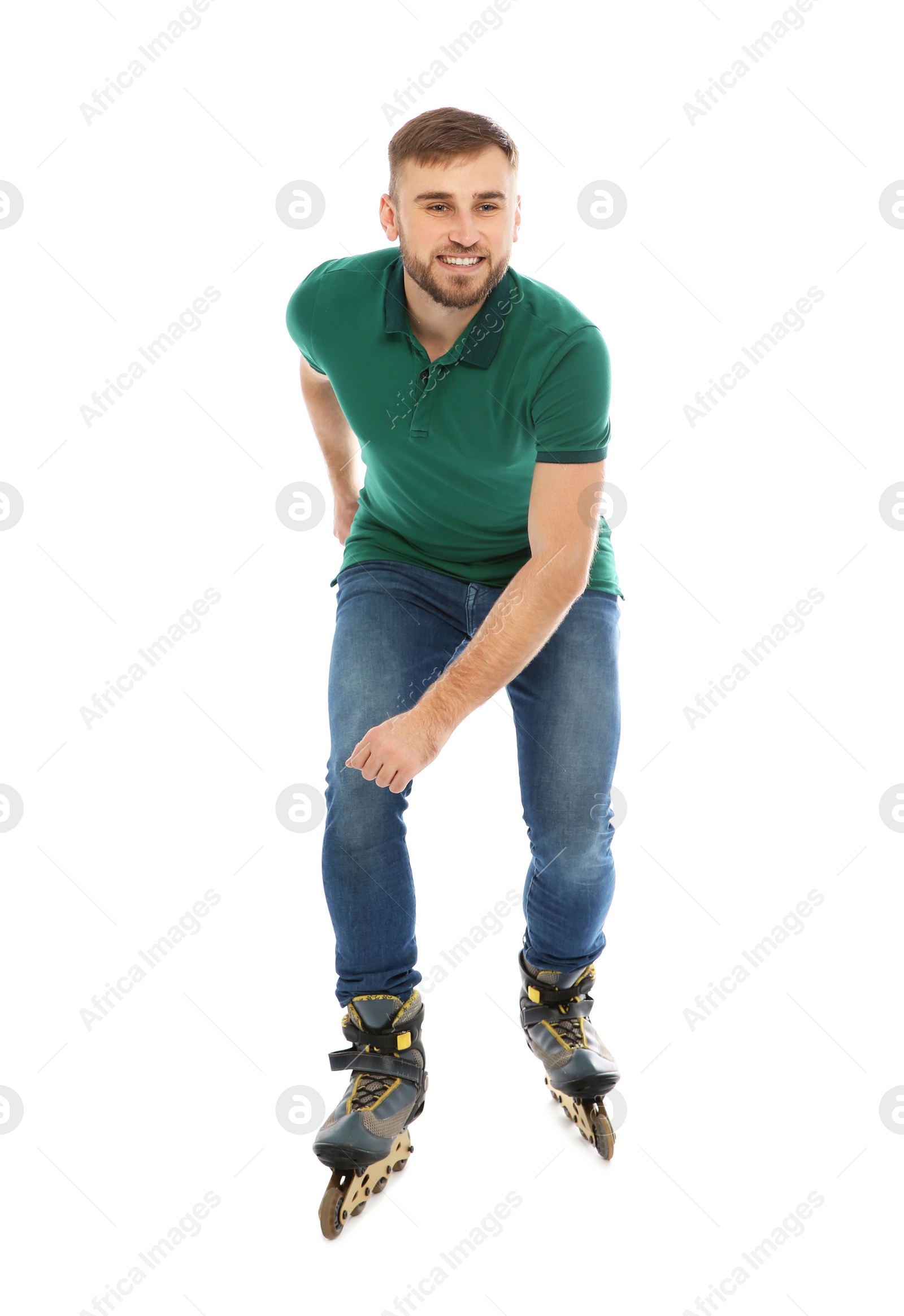 Photo of Young man with inline roller skates on white background