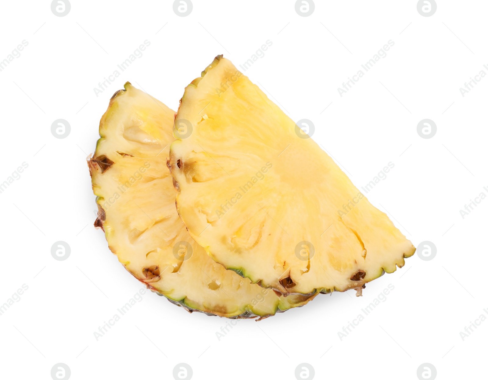 Photo of Slices of tasty ripe pineapple isolated on white, top view