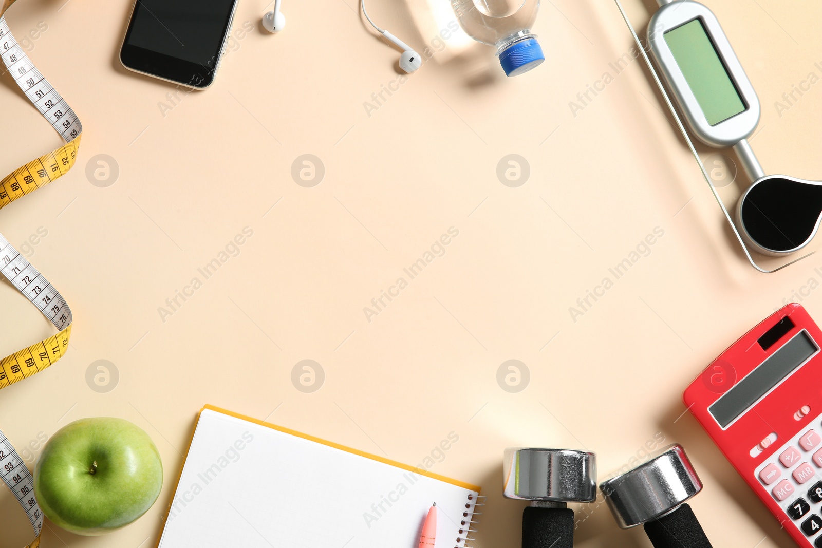 Photo of Flat lay composition with scales, measuring tape, calculator and space for text on color background. Weight loss concept