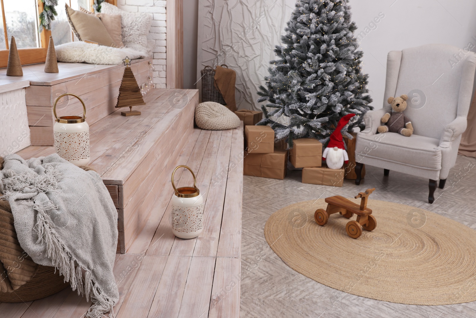 Photo of Stylish room interior with Christmas tree and festive decor