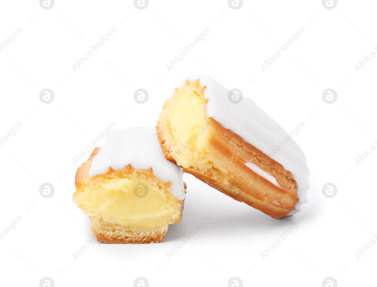 Photo of Cut delicious eclair covered with glaze isolated on white