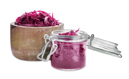 Photo of Bowl and jar with tasty red cabbage sauerkraut isolated on white