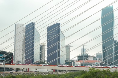 Photo of View of beautiful city from modern bridge