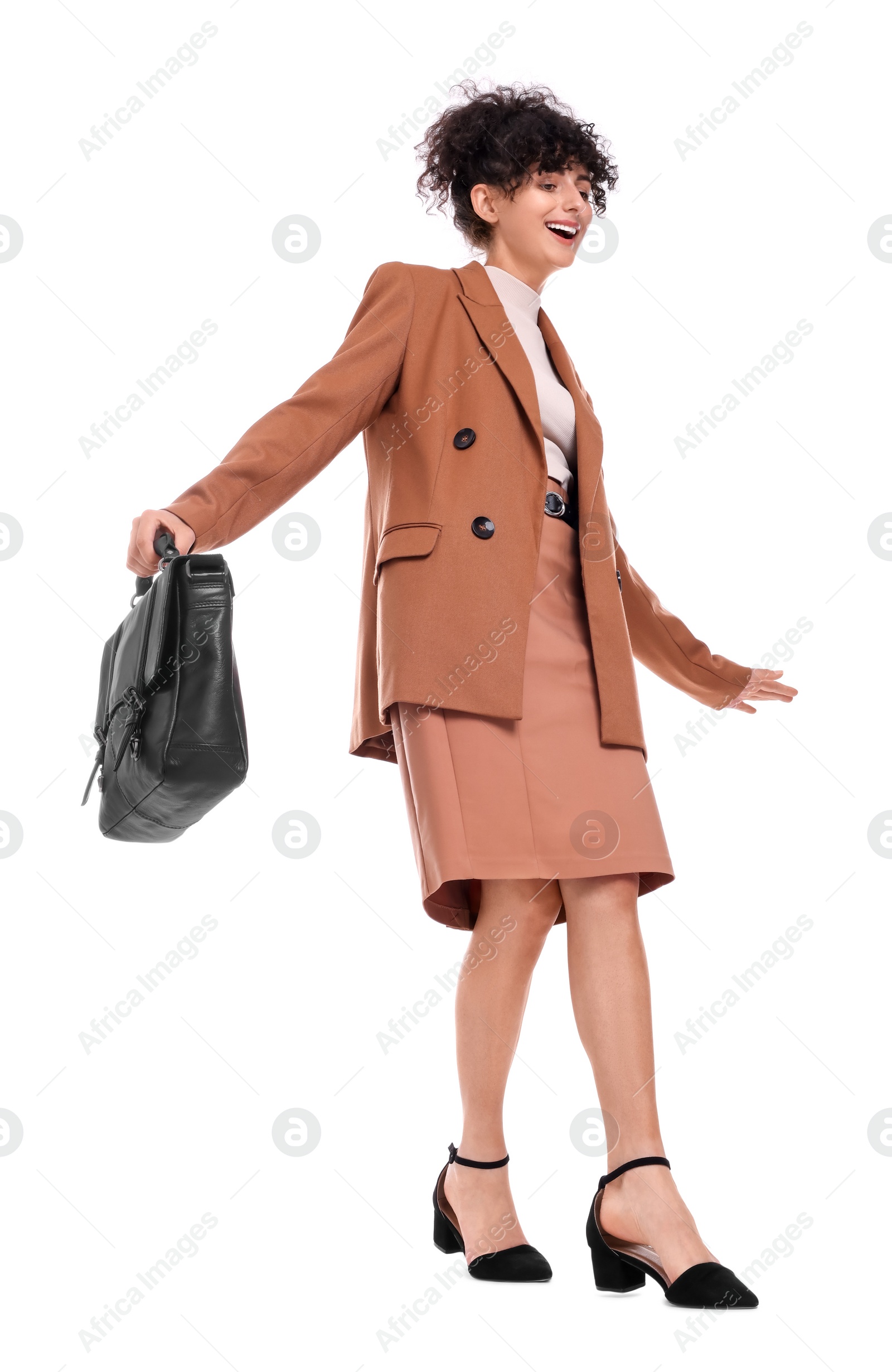 Photo of Beautiful businesswoman in suit with briefcase walking on white background