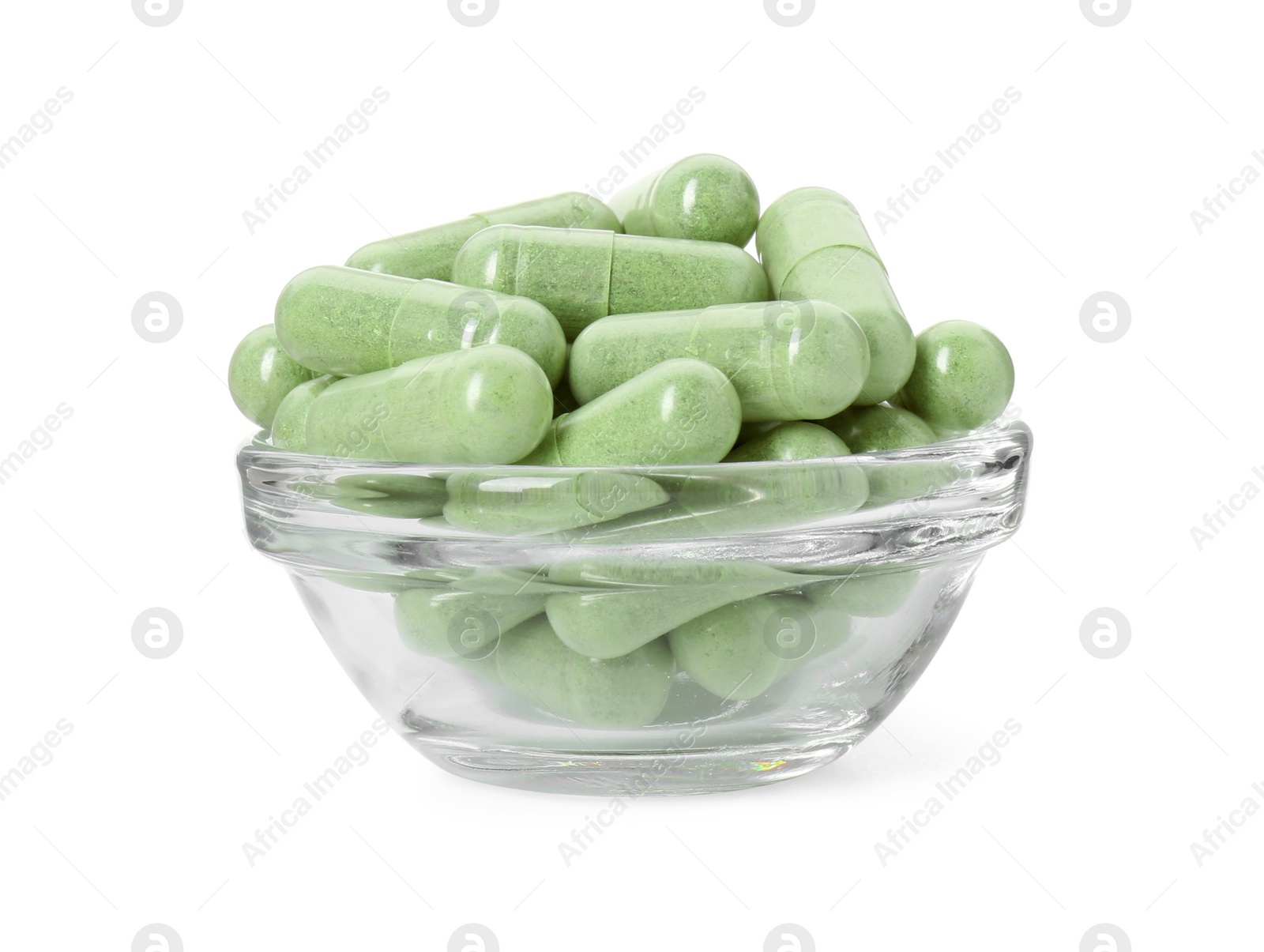 Photo of Vitamin capsules in bowl isolated on white. Health supplement