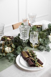 Stylish elegant table setting for festive dinner indoors