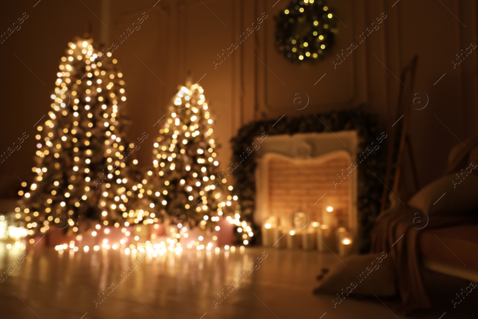 Photo of Blurred view of festive room interior with Christmas trees