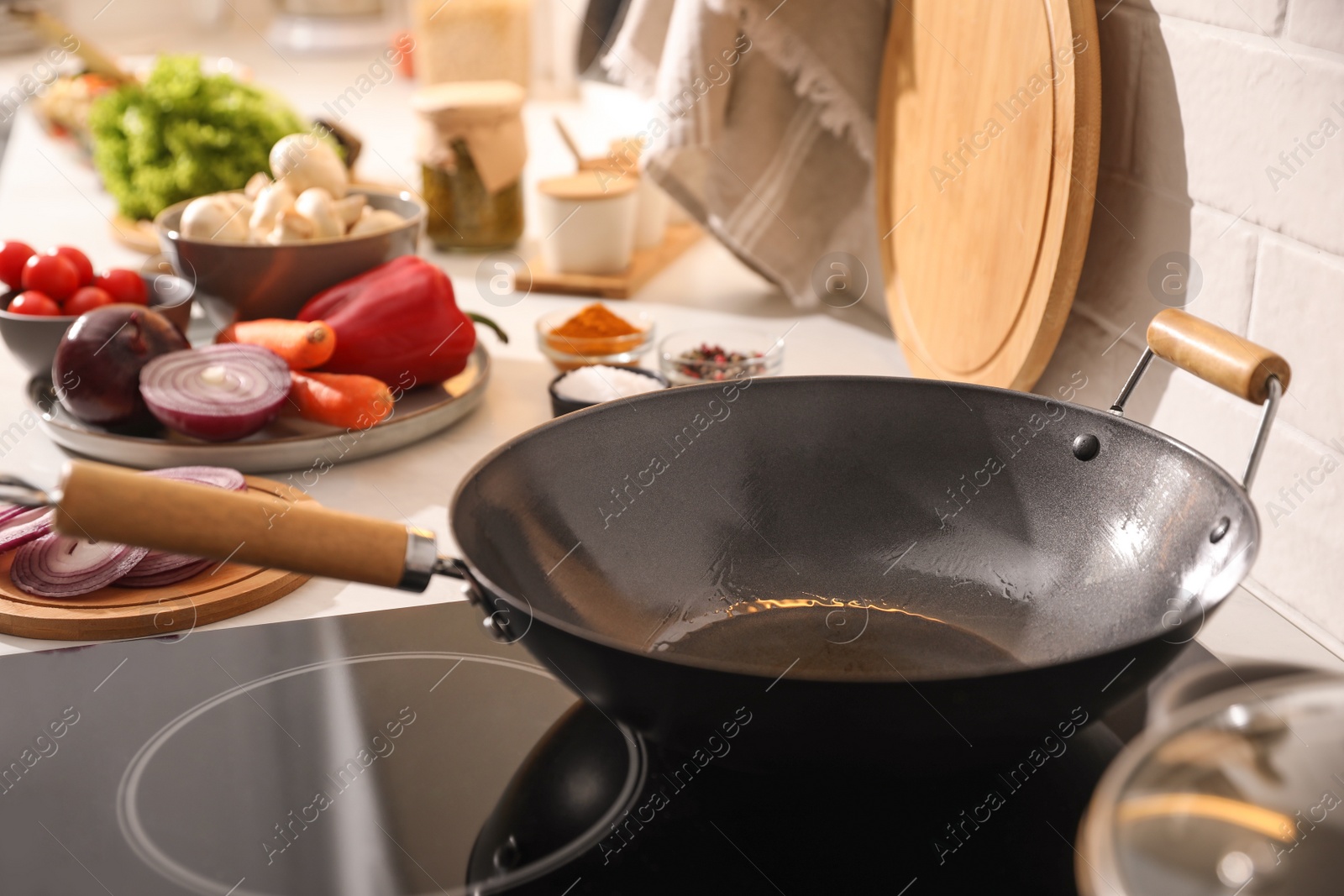 Photo of Frying pan with cooking oil on stove