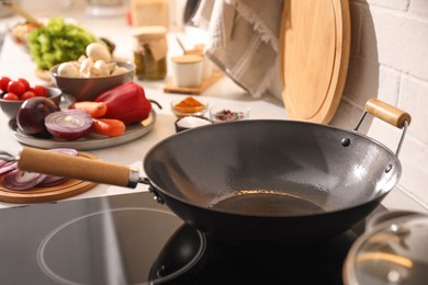 Photo of Frying pan with cooking oil on stove