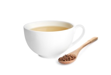 Photo of Buckwheat tea and granules on white background