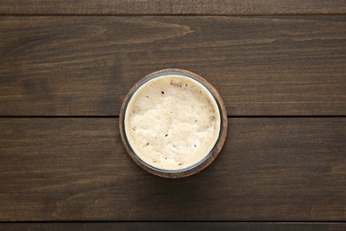 Fresh leaven on wooden table, top view