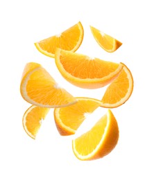 Image of Juicy orange slices flying on white background