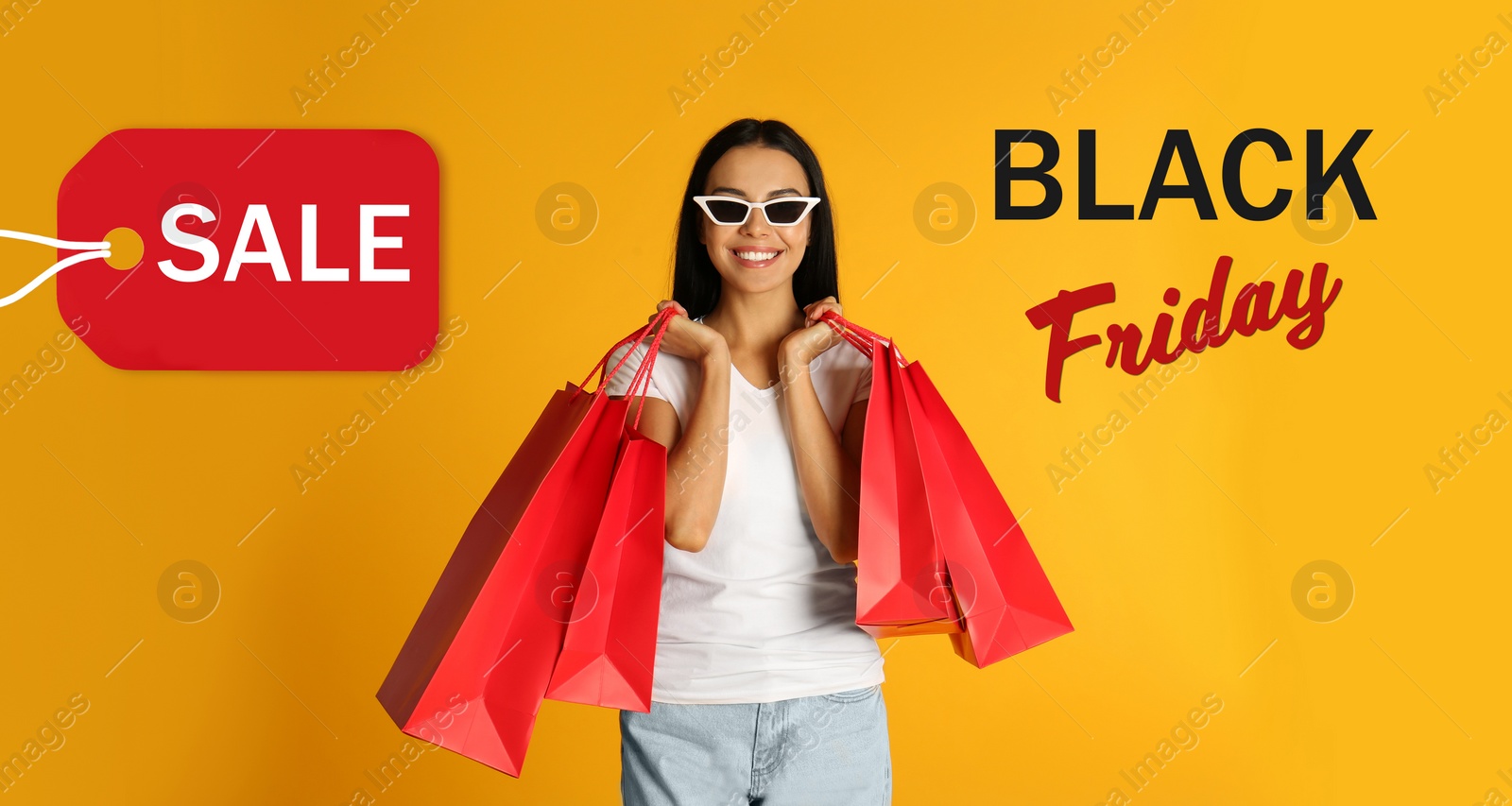 Image of Black Friday Sale. Beautiful young woman with shopping bags on yellow background 