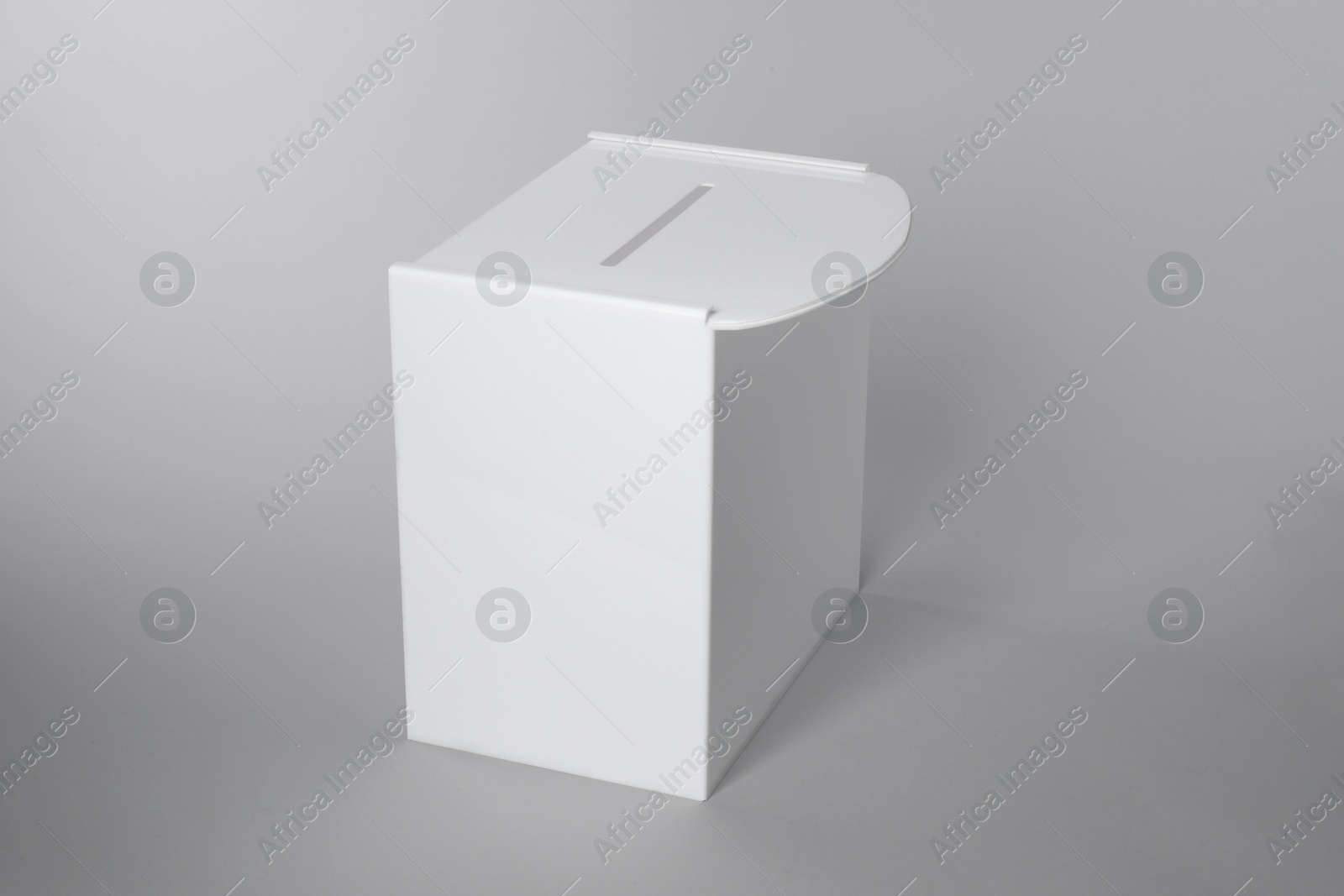 Photo of One ballot box on light grey background. Election time