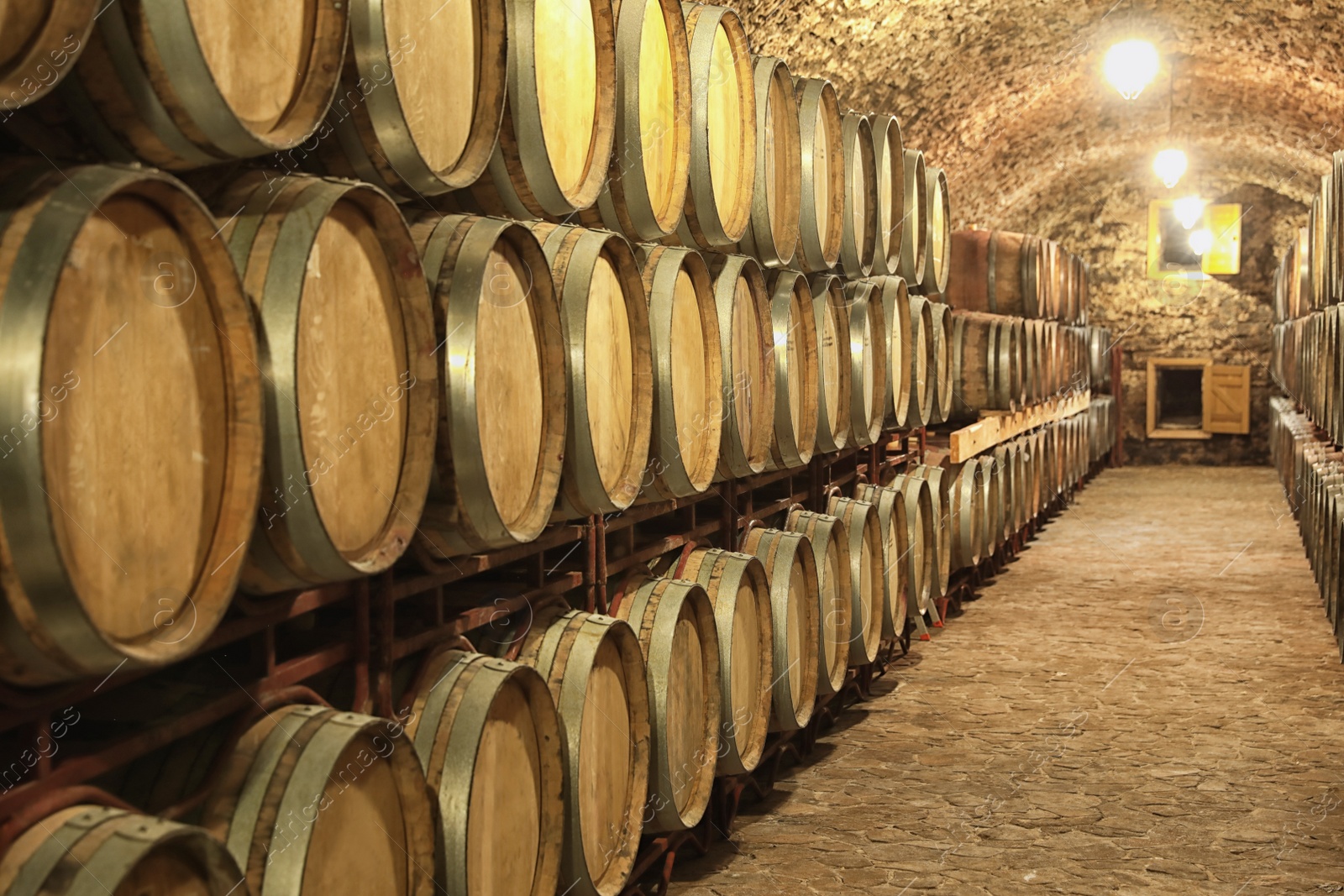 Photo of Wine cellar interior with large wooden barrels