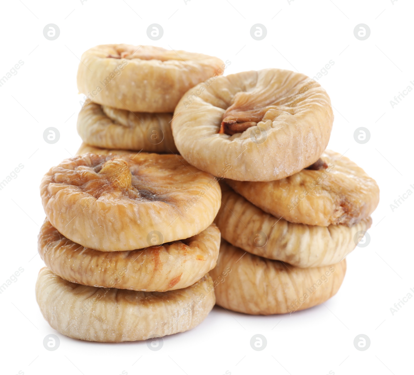 Photo of Pile of tasty dried figs isolated on white