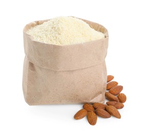 Photo of Paper bag with almond flour and nuts isolated on white