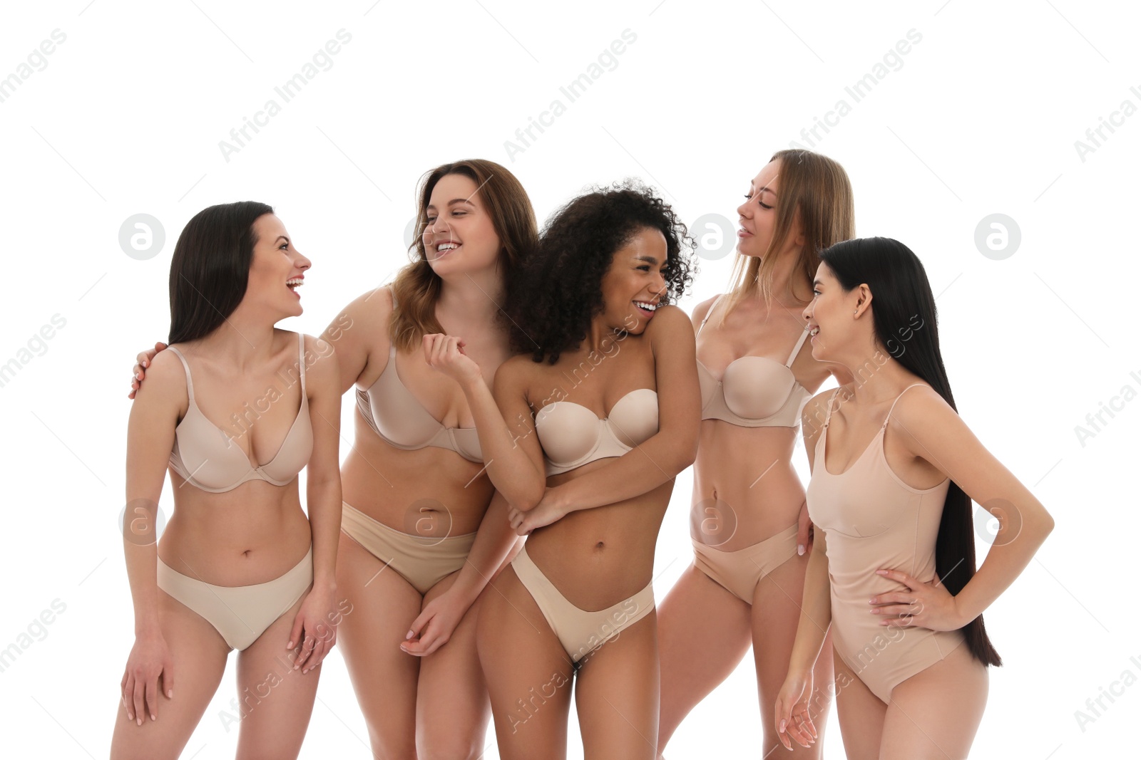 Photo of Group of women with different body types in underwear on white background