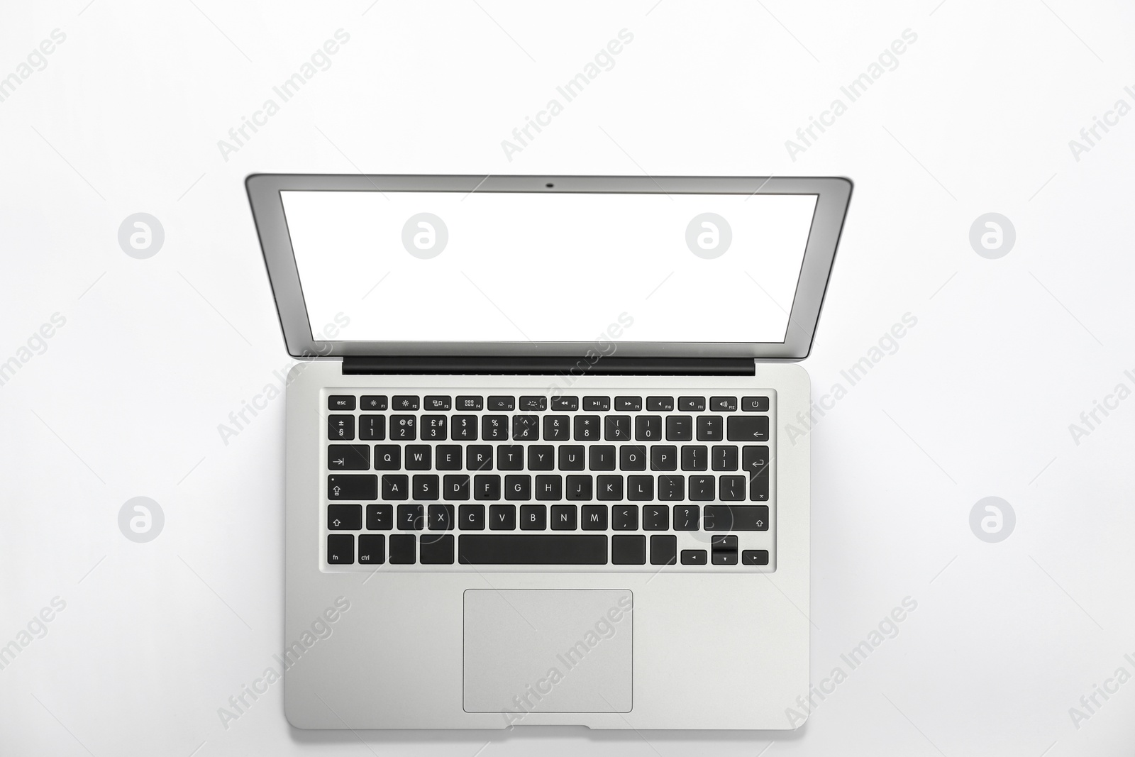 Photo of Modern laptop with blank screen isolated on white, top view