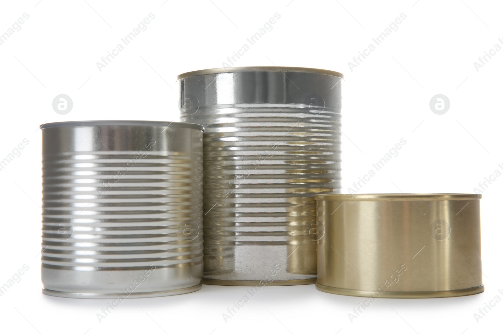 Photo of Closed tin cans isolated on white, mockup for design