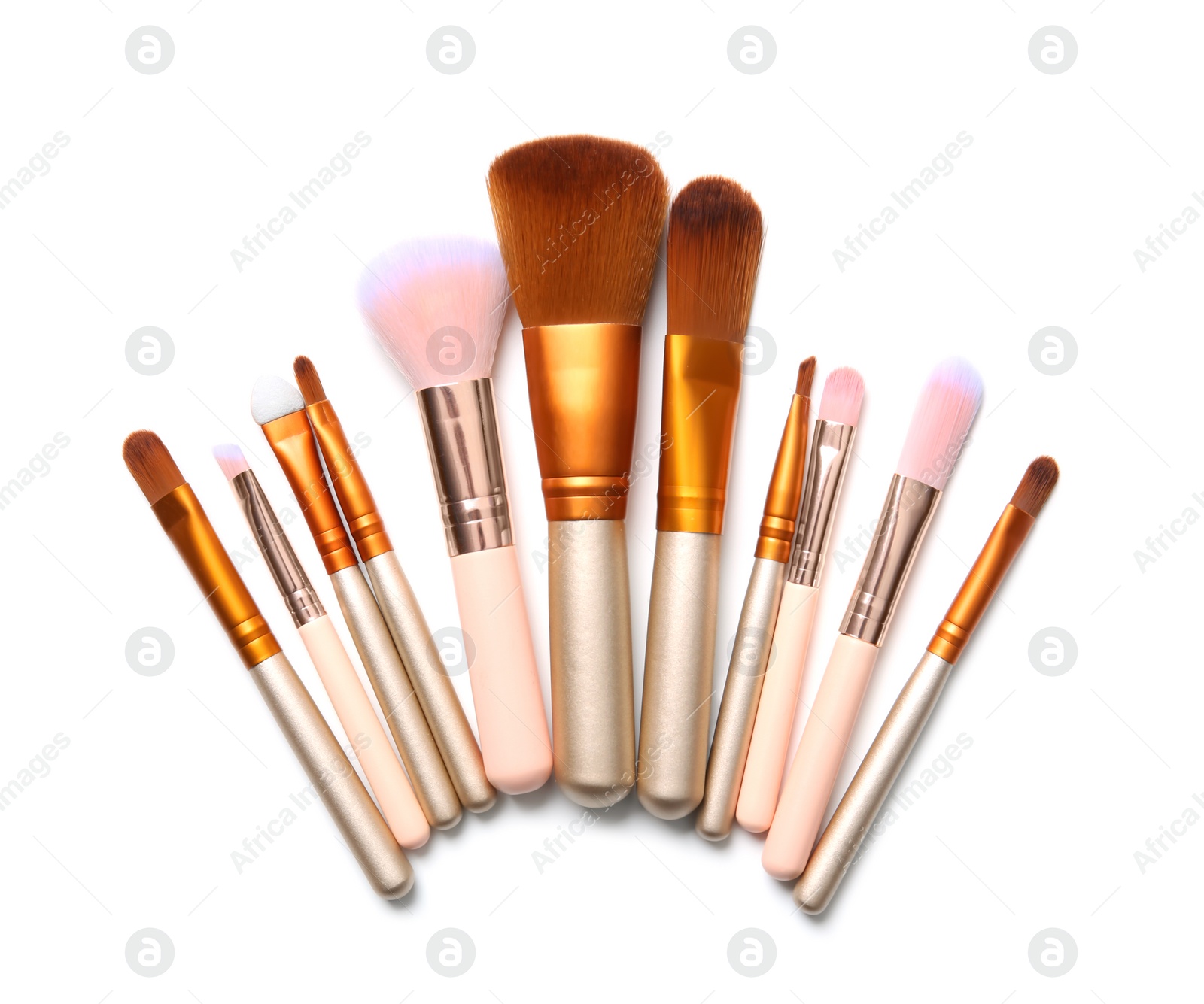 Photo of Flat lay composition with makeup brushes of professional artist on white background