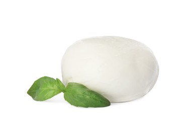 Photo of Delicious mozzarella cheese ball and basil on white background