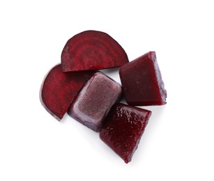 Frozen beetroot puree cubes and fresh beetroot isolated on white, top view