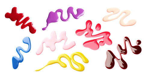 Image of Set of different spilled nail polishes on white background, top view. Banner design