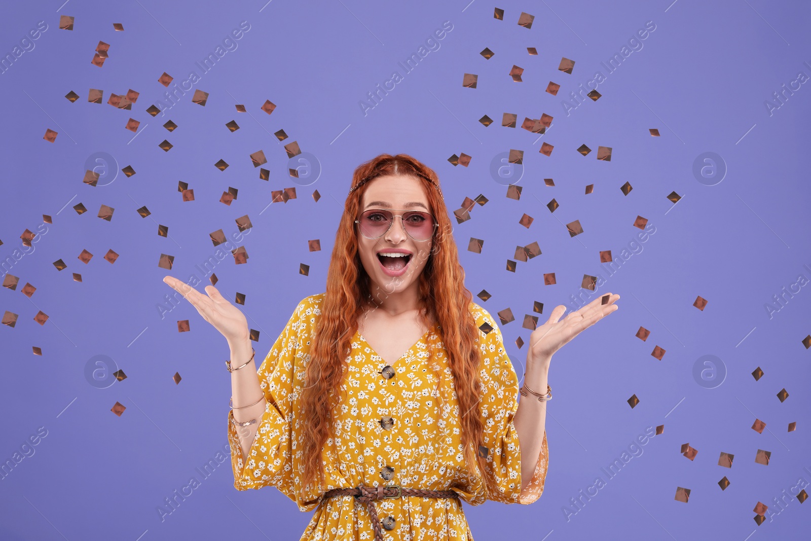 Image of Happy woman and flying confetti on blue violet background