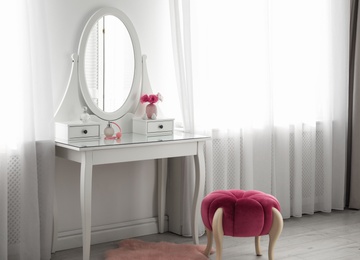 Photo of Stylish room interior with white dressing table