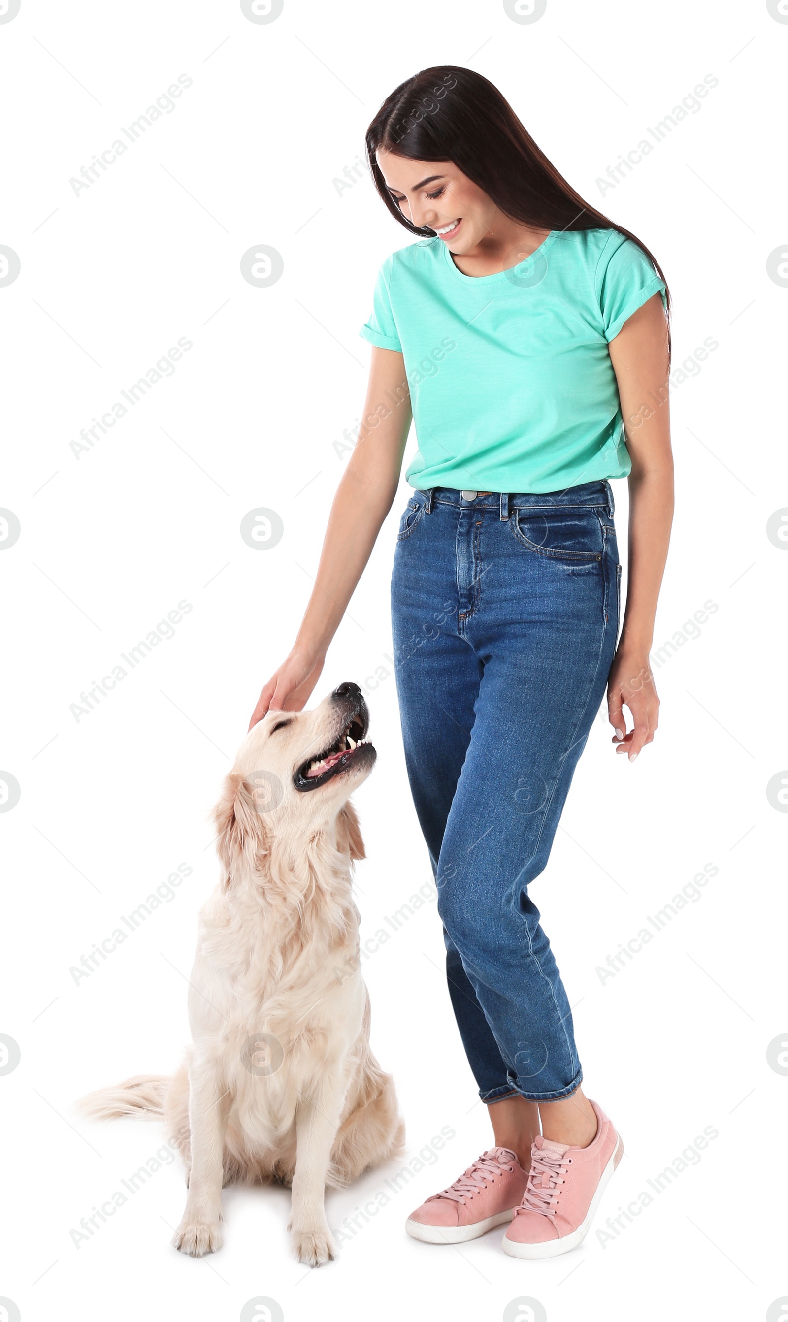 Photo of Young woman and her Golden Retriever dog on white background