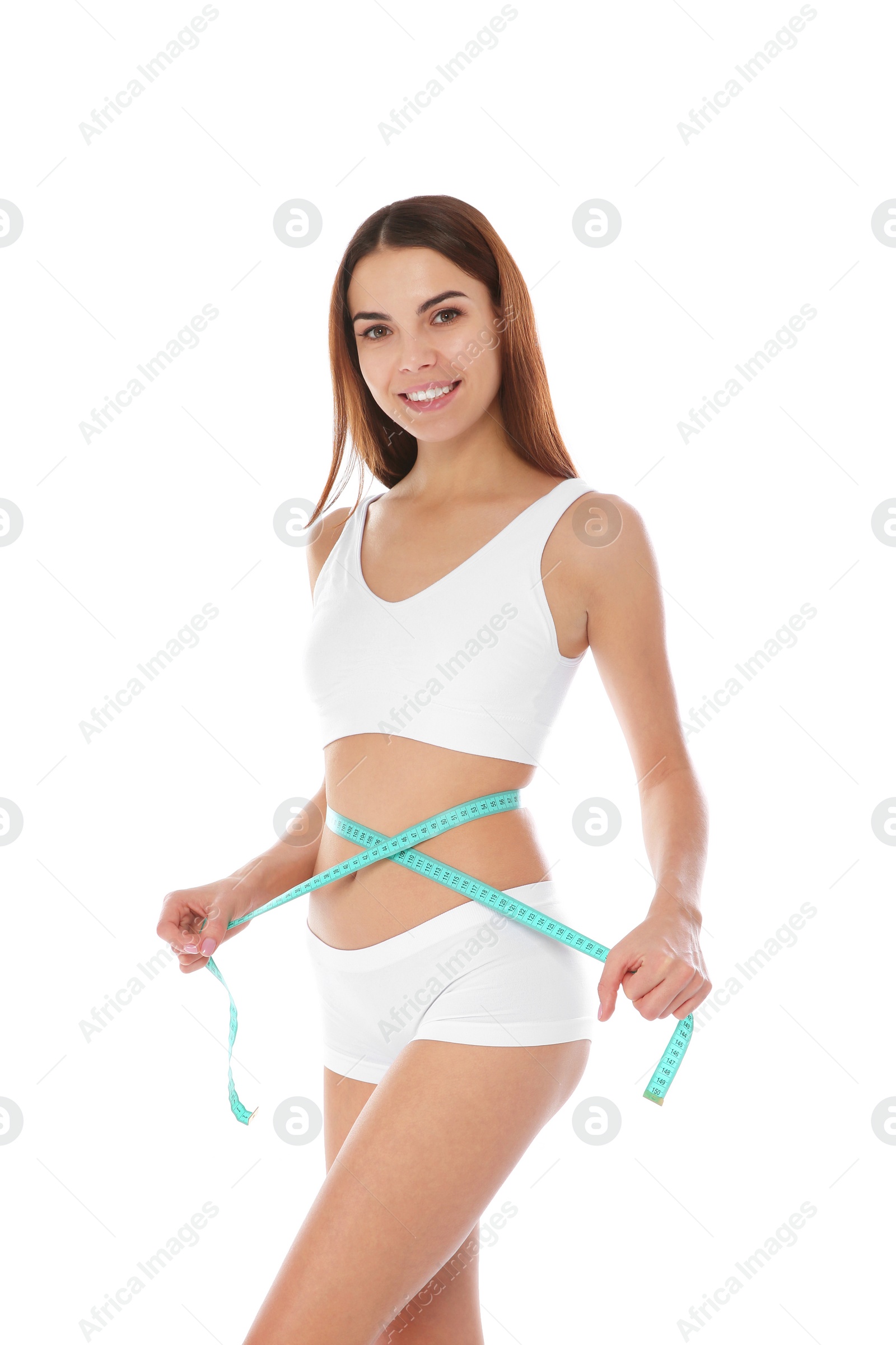 Photo of Slim woman measuring her waist on white background. Weight loss