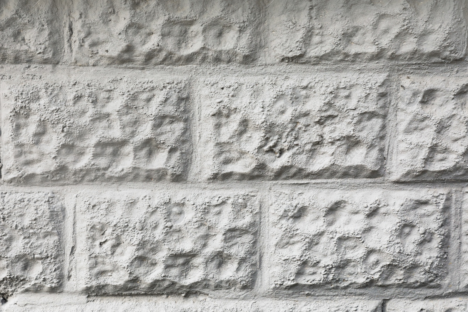 Photo of Texture of plaster brick wall imitation as background