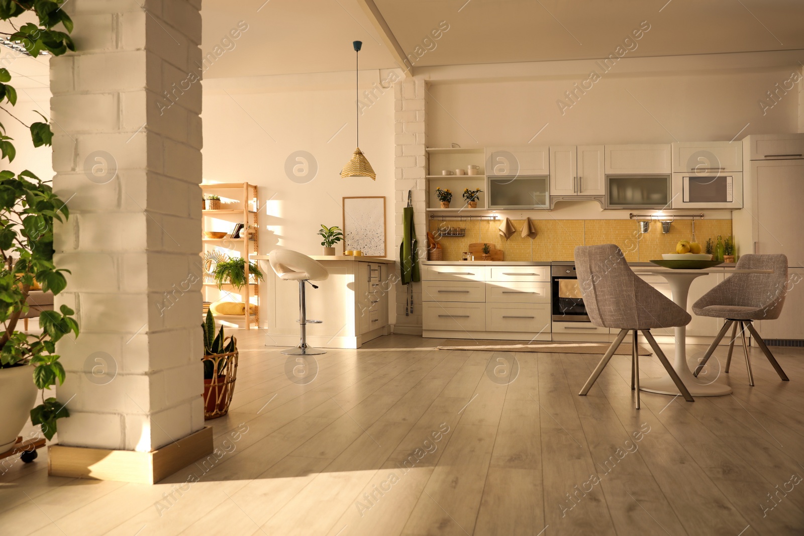 Photo of Modern kitchen interior with stylish white furniture