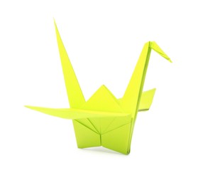 Photo of Origami art. Green handmade paper crane isolated on white