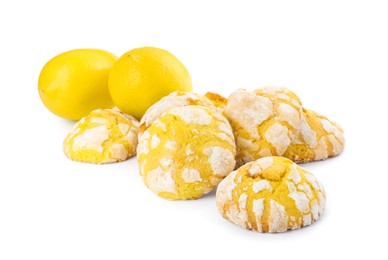 Photo of Tasty homemade lemon cookies and fresh fruits on white background